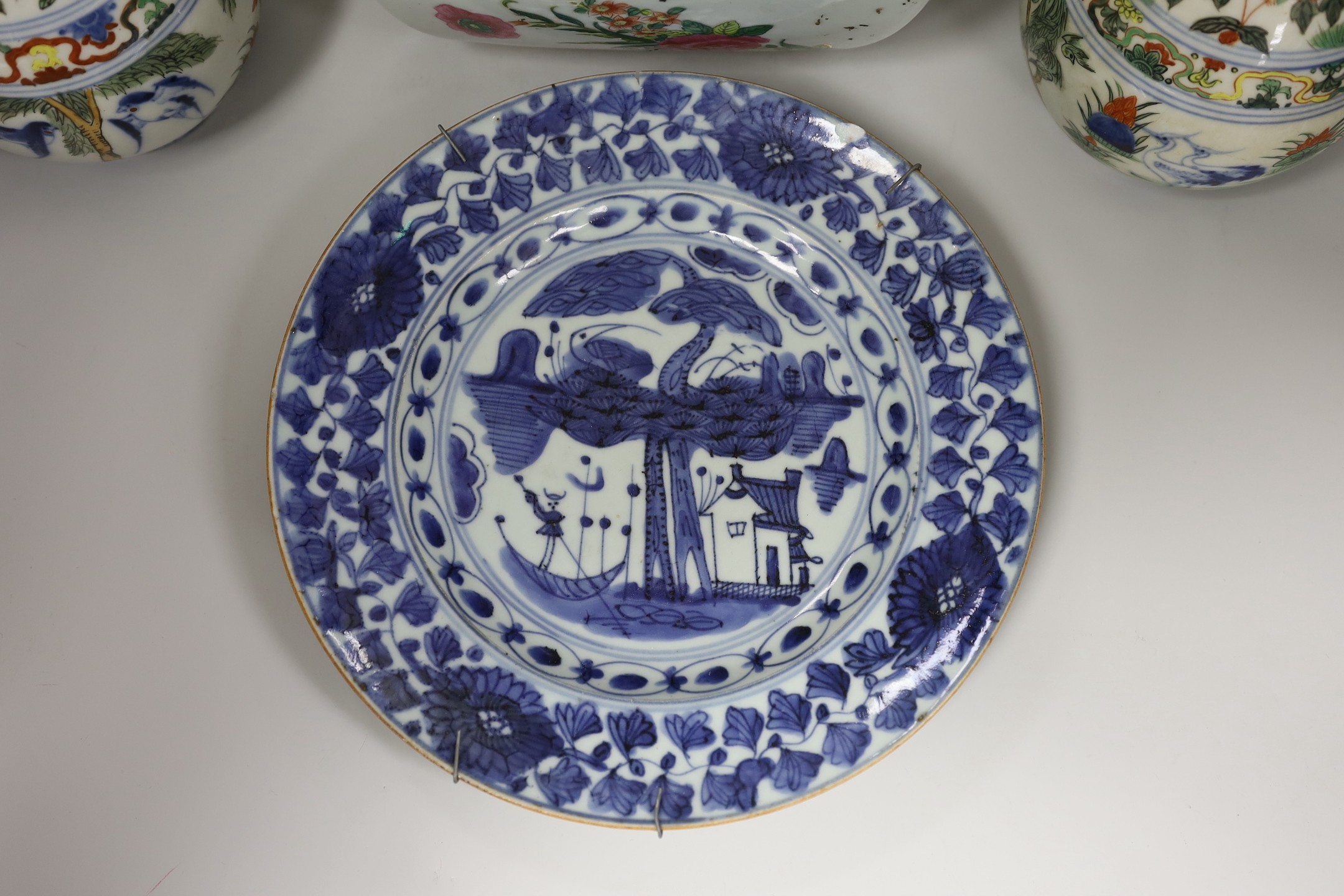 A Chinese style armorial bowl, pair of Chinese clobbered vases and a blue and white plate